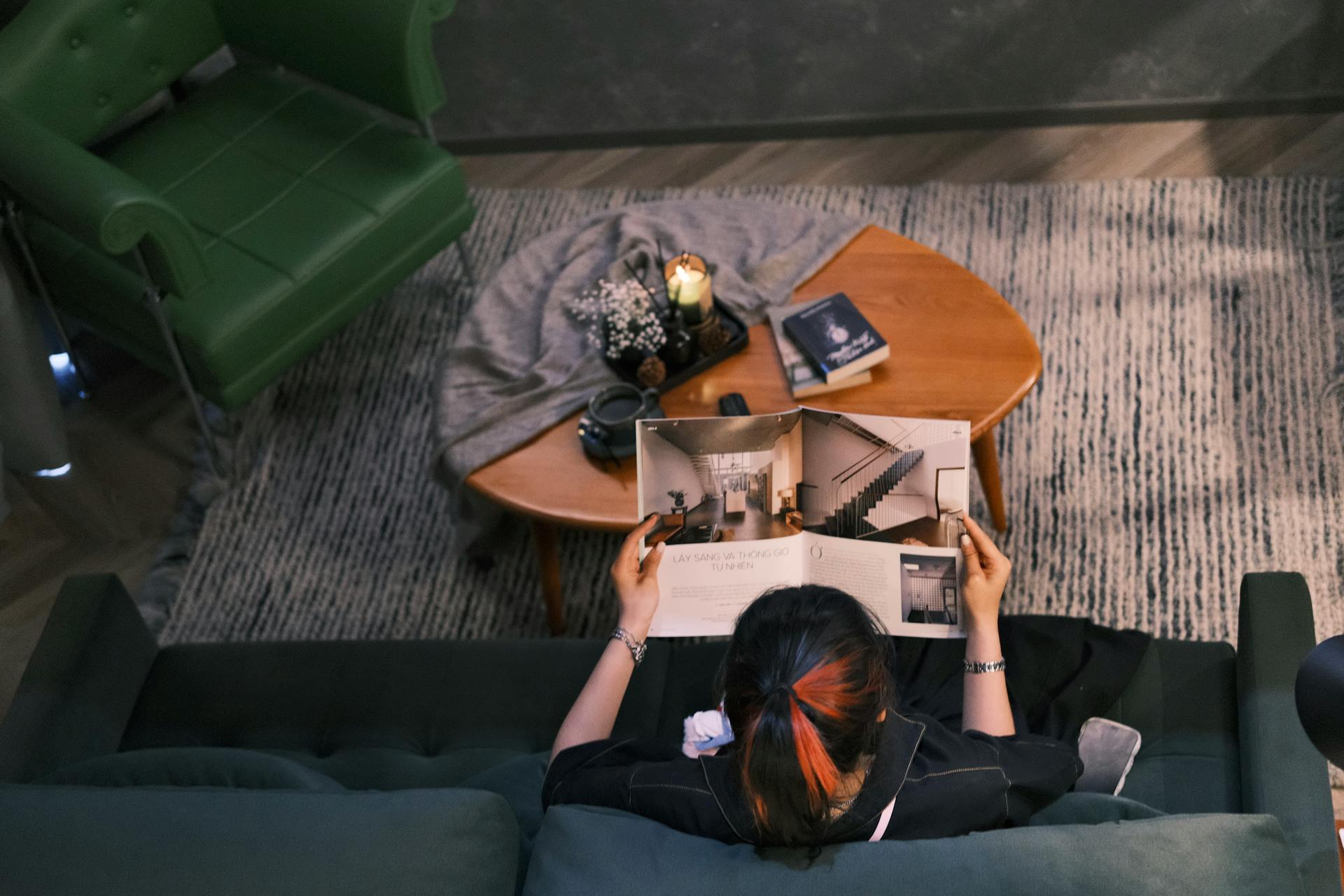 Overhead view of an editorial magazine spread in a quiet luxury interior